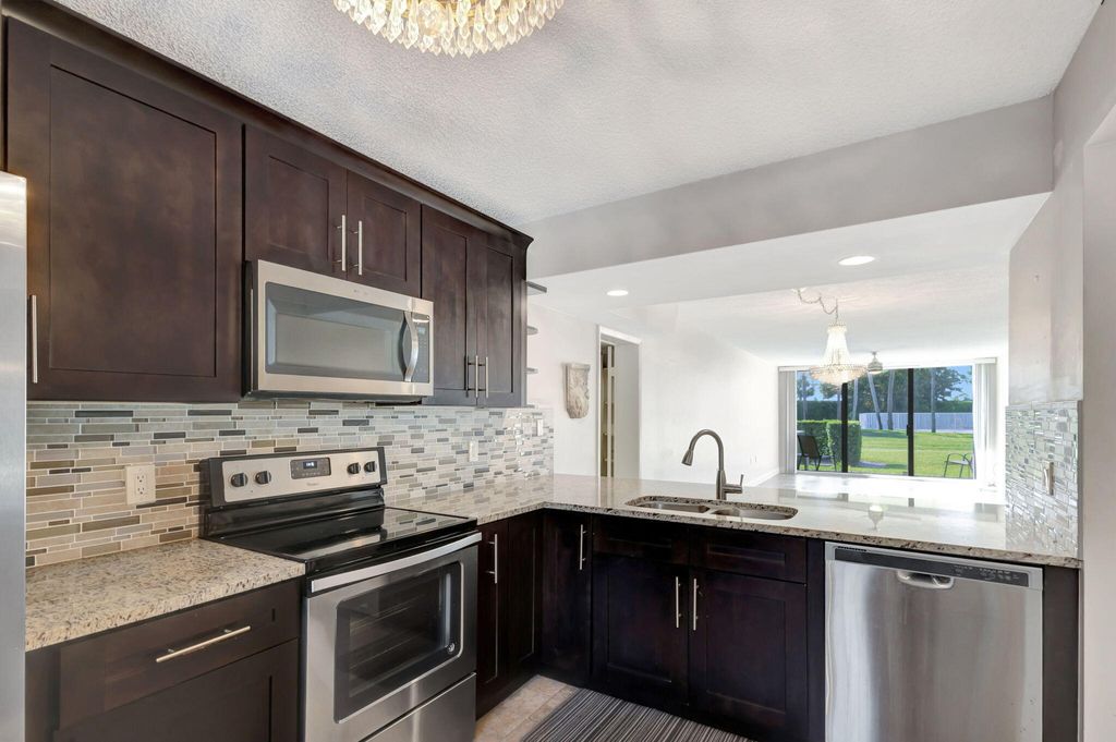 Photo of 2741 Village Boulevard #104, West Palm Beach, FL 33409 (MLS # B26034793)