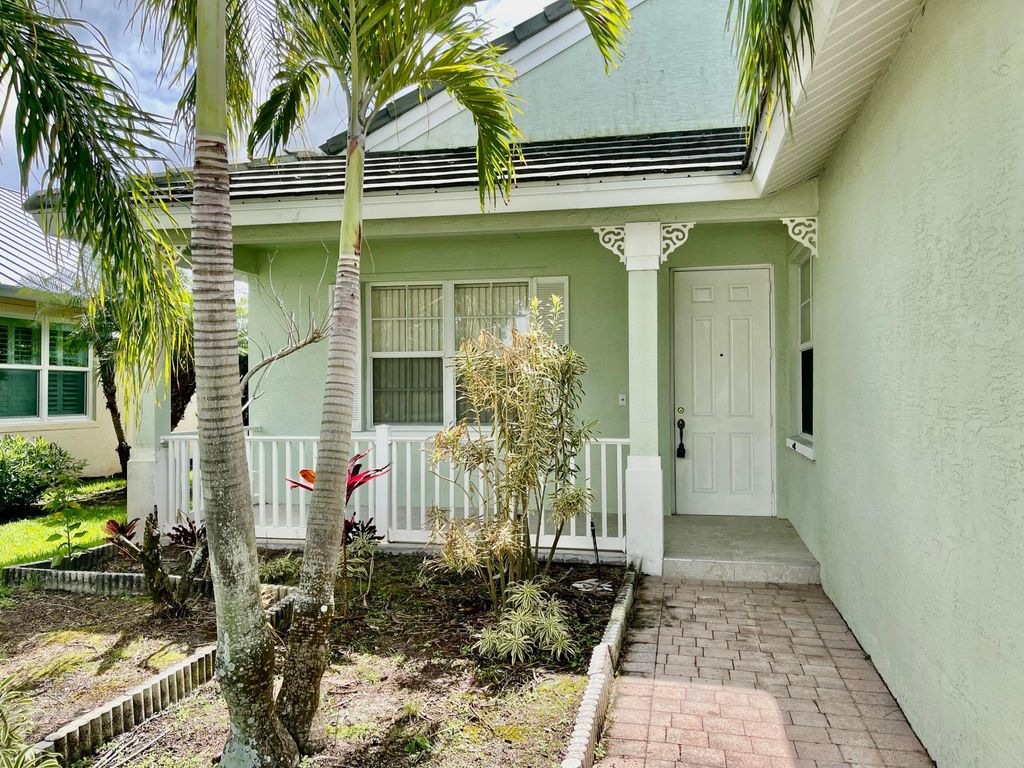 Photo of 185 NW Willow Grove Avenue, Port Saint Lucie, FL 34986 (MLS # B26004432)