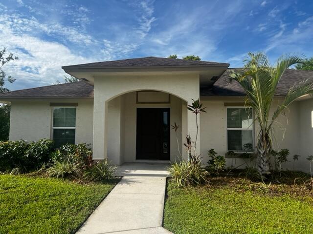 Photo of 2450 SW Mabry Court, Port St Lucie, FL 34953 (MLS # R10912776)