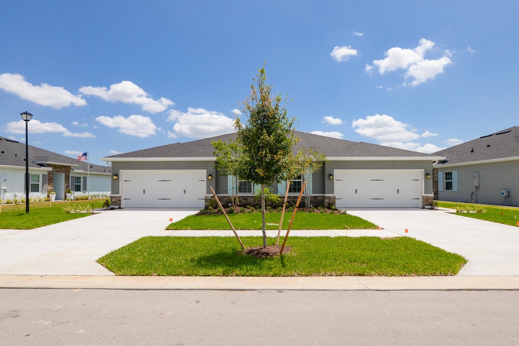 Photo of 9611 SW Libertas Way, Port Saint Lucie, FL 34987 (MLS # R11079342)