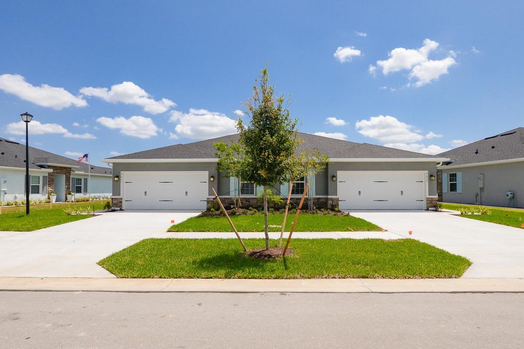 Photo of 9611 SW Libertas Way, Port St Lucie, FL 34987 (MLS # R11079342)