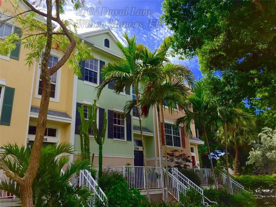 Spacious townhome overlooks lush tropical Key West style courtyard w/ heated pool. Kitchen features granite counters, breakfast bar, upgraded KitchenAid appliances, & cherry panel cabinets. Large screened patio w/ gas grilling station. Master bdrm has tray ceilings, walk-in closet, huge bath w/ double vanity, separate shower/Jacuzzi tub. All tile & real hardwood floorings, new Whirlpool W/D, AC 2013, crown moldings, custom vanities, plantation shutters, & tankless H2O. Close to Wilton Drive! Pets welcome