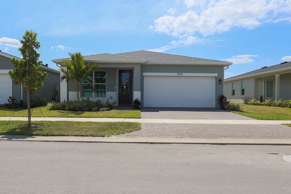 Photo of 9714 SW Indra Way, Port Saint Lucie, FL 34987 (MLS # B26022819)