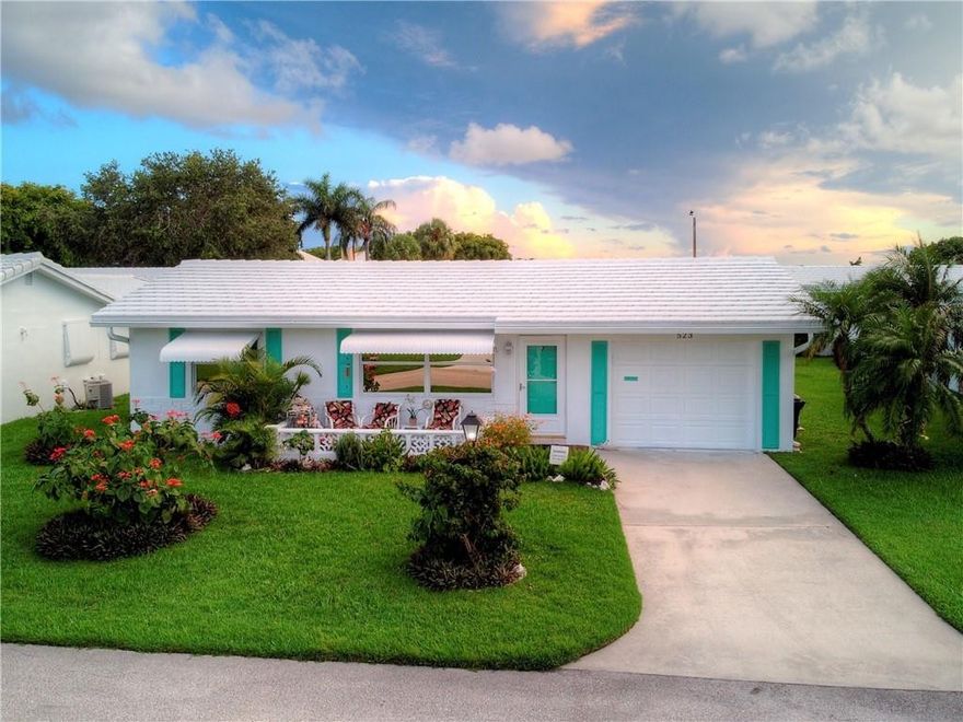 Come experience this inviting home, nestled in Palm Beach Leisureville's active 55+ community. This 2-bedroom, 1-bathroom gem is everything you want in a Floridian home. Continue the beachy cottage look or create your own. Either way, you will find a sense of peace and tranquility. Enjoy the open kitchen, spacious living room, florida room, recently renovated dual bathtub/shower, bedrooms boasting large closets and acacia wood flooring throughout. The roof is approximately 3 yrs old and there are impact windows and doors throughout. The recreation lease has been paid.This home is further enhanced by Palm Beach Leisureville's free 18 hole Par 3 golf course, three clubhouses with outdoor pools, fitness center for an extremely low monthly maintenance fee. Welcome To Your New Paradise!