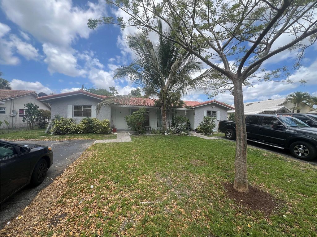 Photo of 4380 NW 79th Terrace, Coral Springs, FL 33065 (MLS # F10502719)