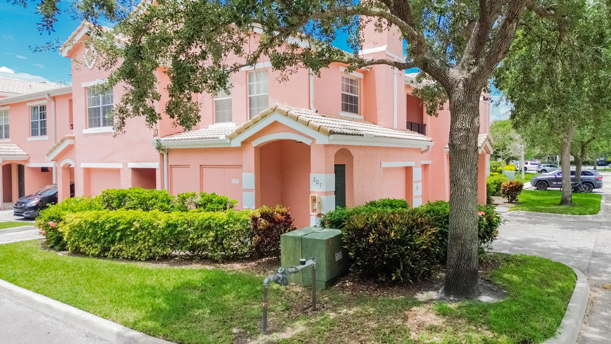 BELMONT AT ST LUCIE WEST! Nice corner 2nd floor 2/2 unit with garage is ready now! Laminate and tile floors throughout, all applicances included. Covered balcony. Community offers resort style clubhouse with pool, hottub, fitness center, play areas, tennis. Exterior maintenance included, valet trash. Convenient to all St Lucie West has to offer, easy commute via I95.