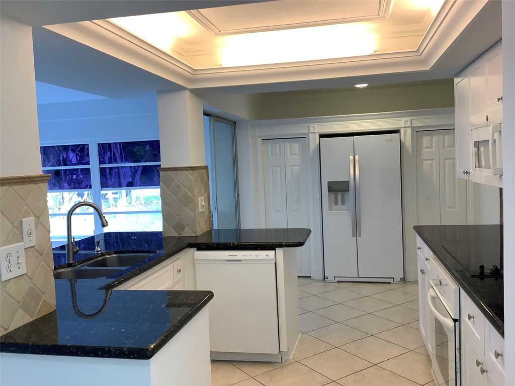 Photo of 4481 NW 1st Terrace, Deerfield Beach, FL 33064 (MLS # F10539703)