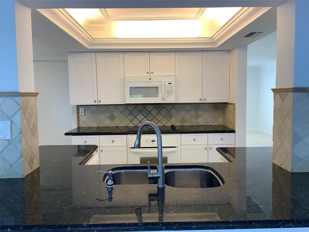 Photo of 4481 NW 1st Terrace, Deerfield Beach, FL 33064 (MLS # F10539703)