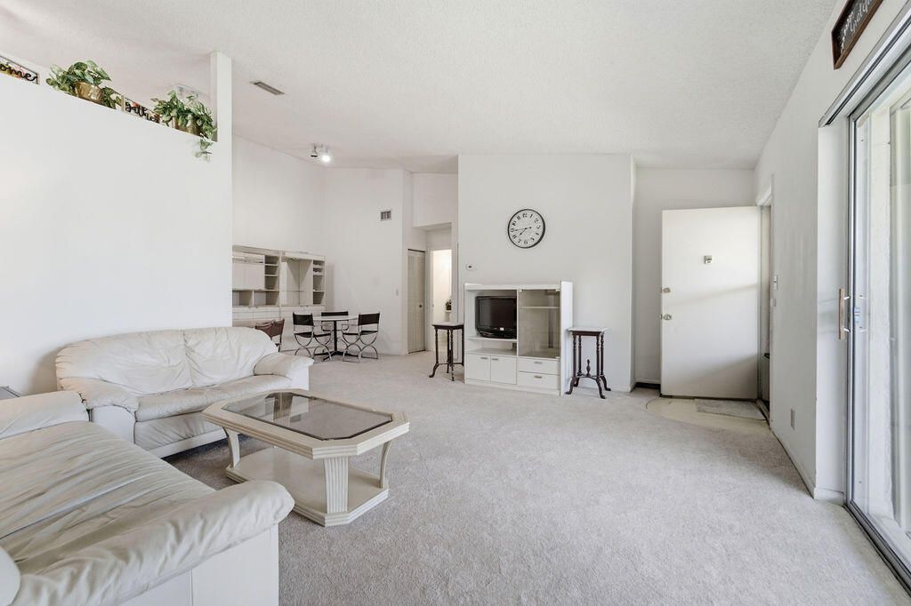 Photo of 6519 Chasewood Drive #E, Jupiter, FL 33458 (MLS # B26027645)