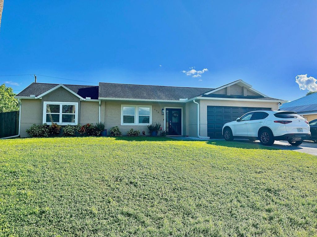 Photo of 664 SW Ester Avenue, Port St Lucie, FL 34983 (MLS # R10928835)