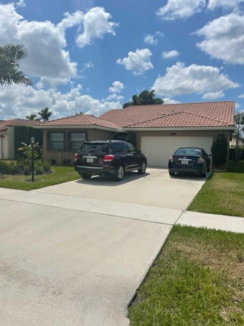 Photo of 8494 Bonita Isle Dr, Lake Worth Beach, FL 33467 (MLS # F10325052)