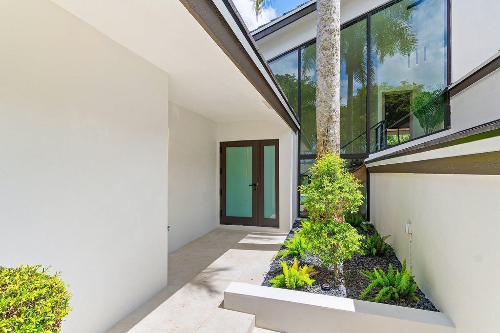 Photo of 2668 NW 41st Street, Boca Raton, FL 33434 (MLS # B26014745)