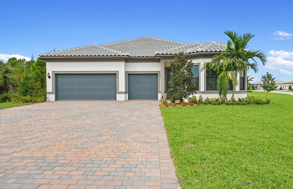 Photo of 325 SE Filoli Drive, Port Saint Lucie, FL 34984 (MLS # R11006278)