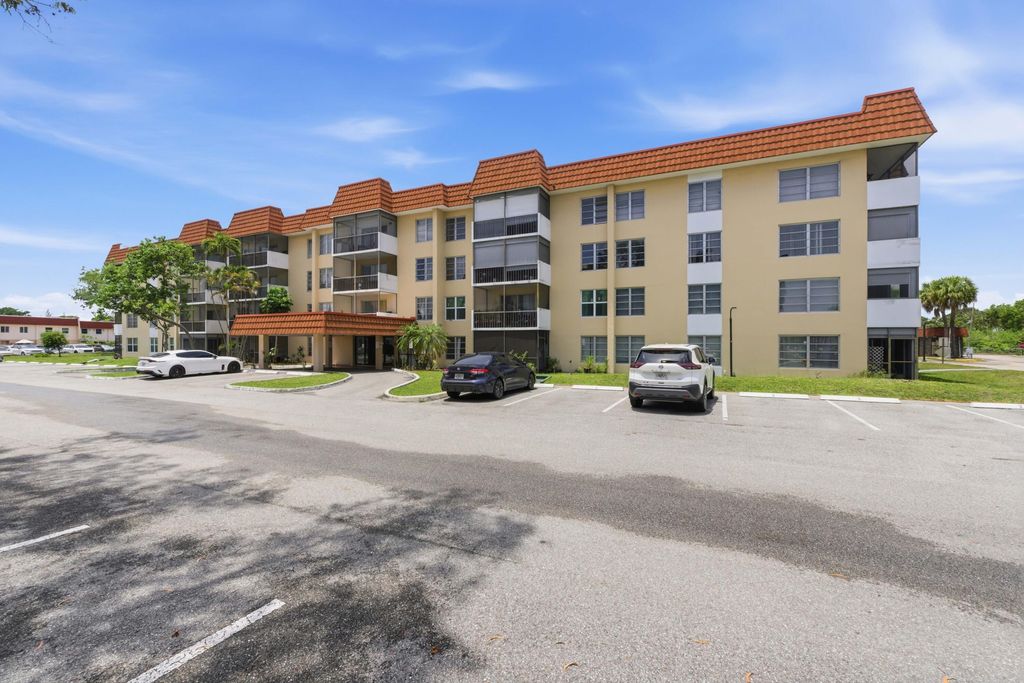 Photo of 4152 Inverrary Drive #311, Lauderhill, FL 33319 (MLS # B26027521)