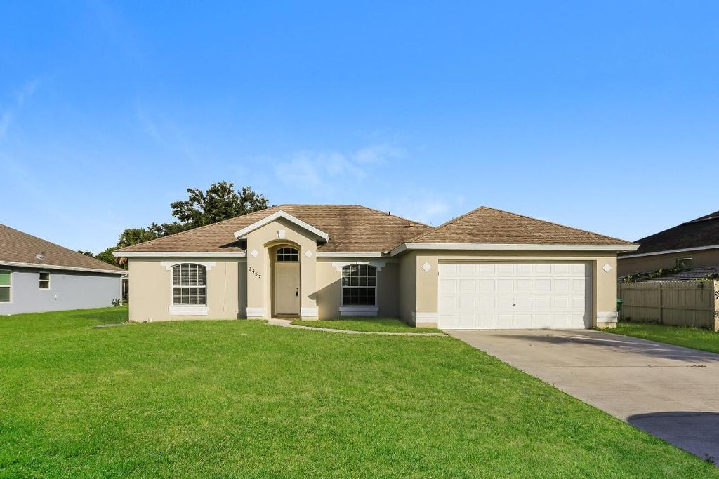 Photo of 2457 SE Betty Road, Port Saint Lucie, FL 34952 (MLS # R10936763)