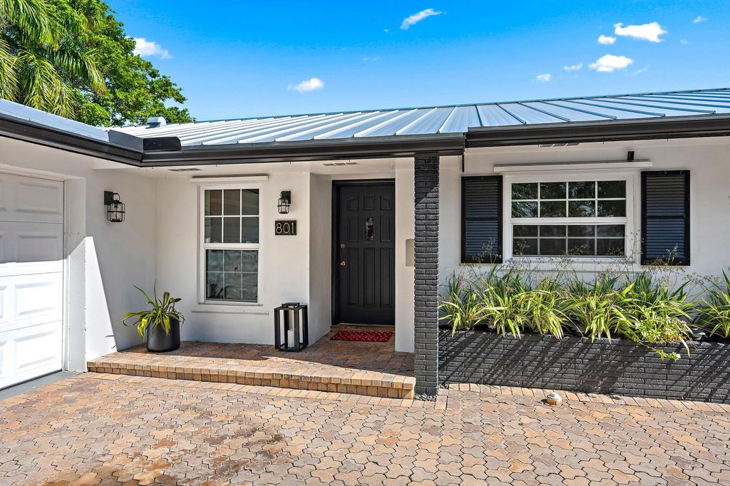 Photo of 801 Fairhaven Drive, North Palm Beach, FL 33408 (MLS # B26002189)