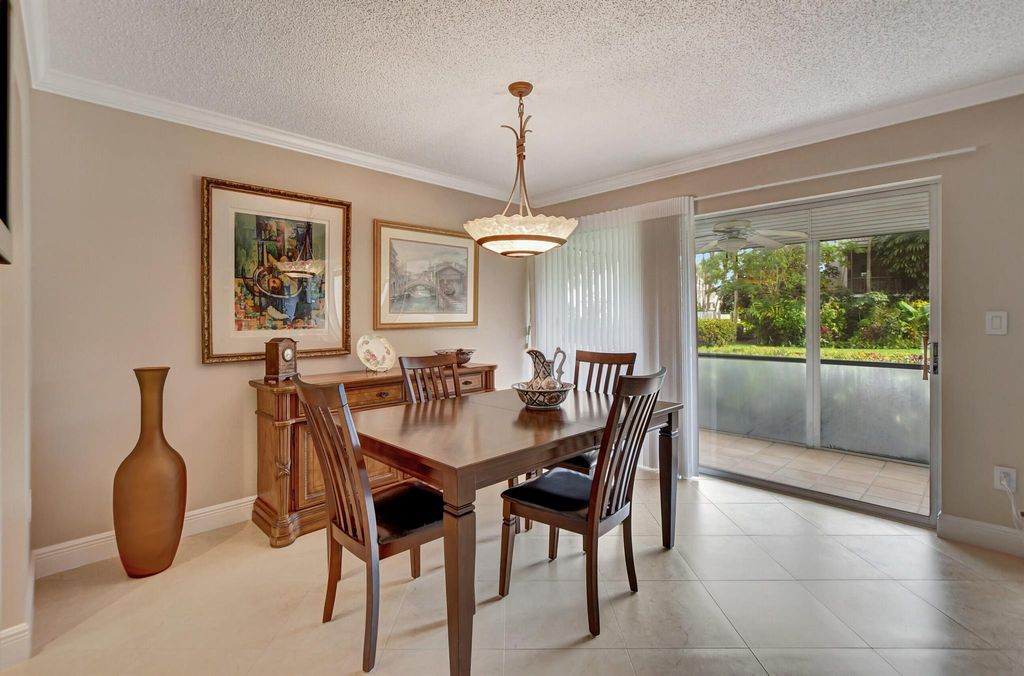 Photo of 6890 Willow Wood Drive #203, Boca Raton, FL 33434 (MLS # R11094887)