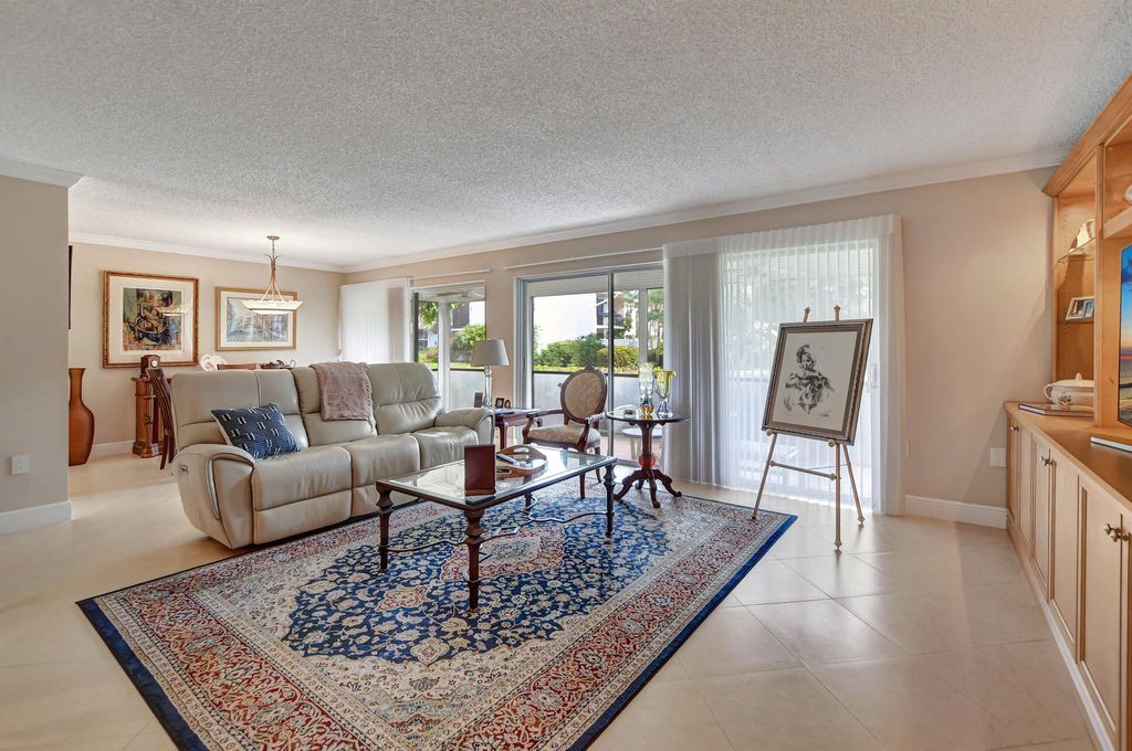 Photo of 6890 Willow Wood Drive #203, Boca Raton, FL 33434 (MLS # R11094887)