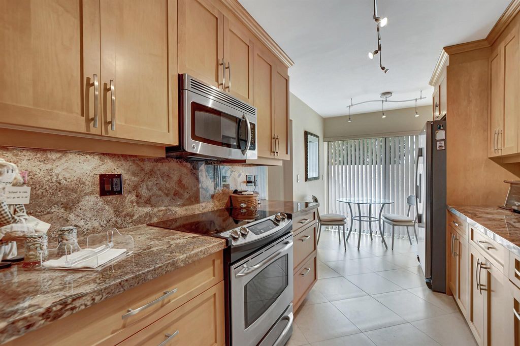 Photo of 6890 Willow Wood Drive #203, Boca Raton, FL 33434 (MLS # R11094887)