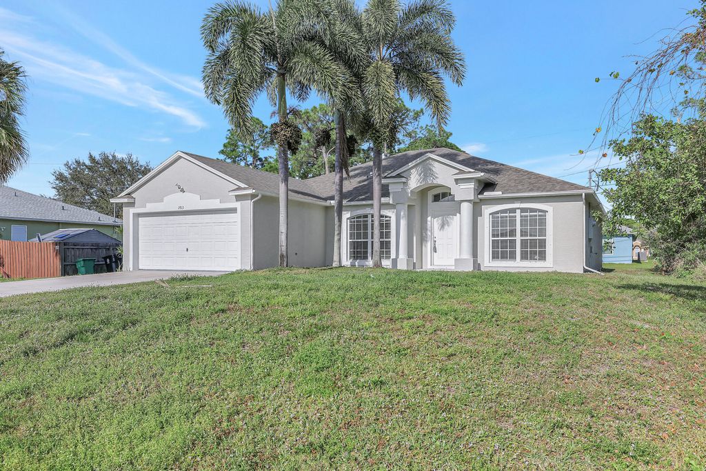 Photo of 1913 SW Mackenzie Street, Port Saint Lucie, FL 34953 (MLS # R10940712)