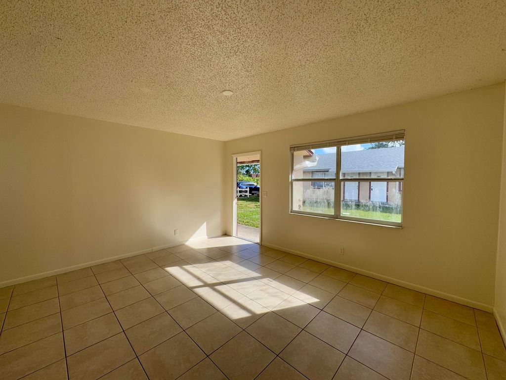 Photo of 4109 42nd Way S, Lake Worth, FL 33461 (MLS # R11045929)