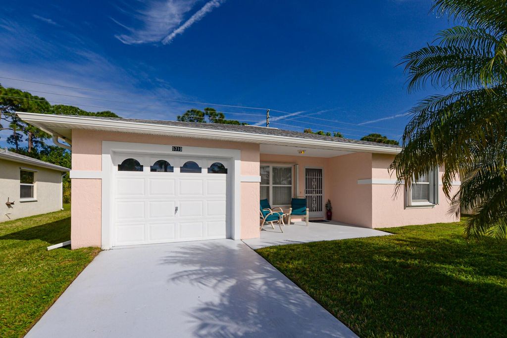 Photo of 5710 Travelers Way, Fort Pierce, FL 34982 (MLS # R10951045)
