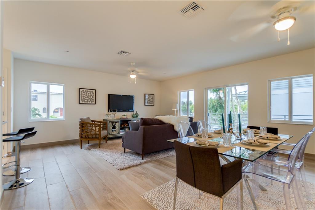 Wilton Manors townhouse just blocks from Wilton Drive! NEW in 2018! 2 bedrooms plus den/office/3rd bedroom. Sleek and Contemporary, TRI-Level town homes with 9' ceilings. Bright and open concept with modern kitchen, tile, designer lighting, granite, marble & stone finishes. Huge master suite with walk-in closets & super-sized shower. Extra large balcony/terrace, W/D in unit, 2 car garage, pets ok. First floor office/den can also be used as a third bedroom. Exceptional location, exceptional construction and plenty of space. Available for immediate move in. Vacant and easy to show. FOLLOW SHOWING PROTOCOL DURING THIS COVID-19 TIME. Photos are of staged unit. Units are no longer staged, and come unfurnished. Units delivered without window treatments.