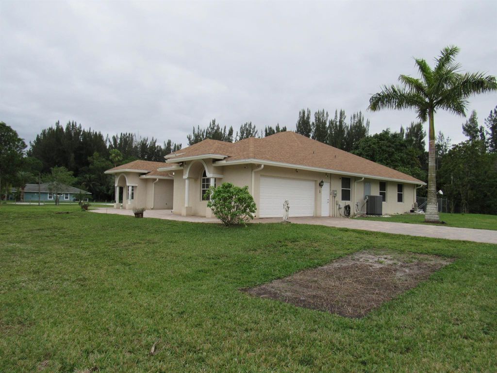 Photo of 6090 140th Avenue N, West Palm Beach, FL 33412 (MLS # R10945919)
