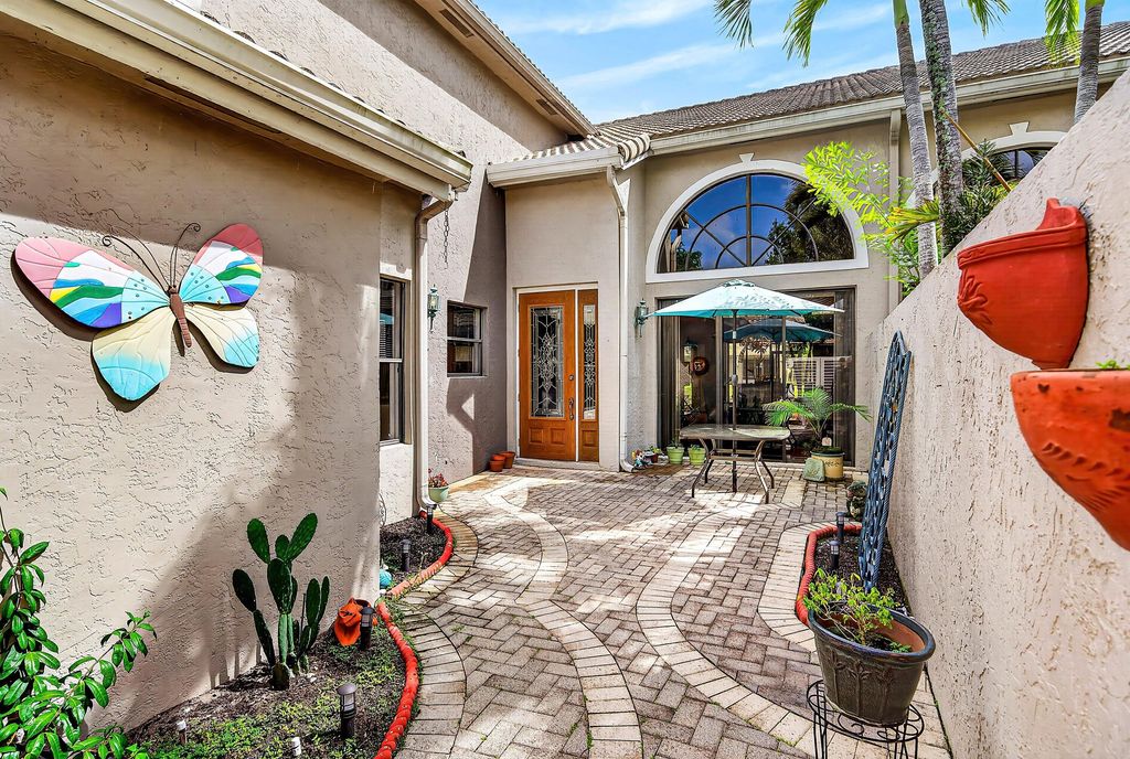 Photo of 5315 Monterey Circle #F, Delray Beach, FL 33484 (MLS # B26017478)