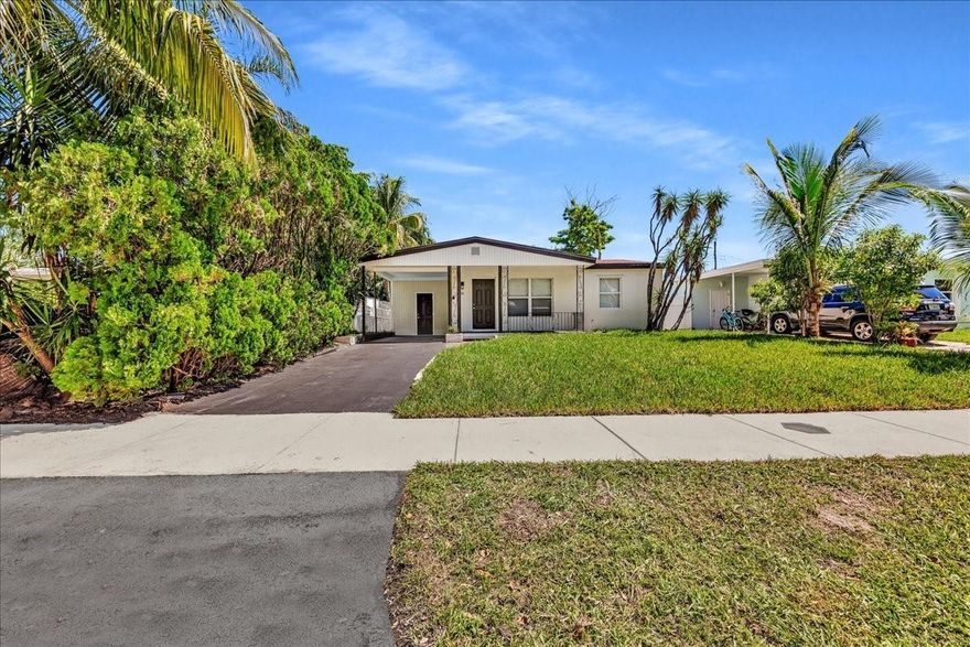 PRICE DROP! All remodeled & upgraded (WITH PERMITS) perfect 3 bed/2 bath home with carport & large fenced in backyard, ready to move in! Located in highly desirable North Andrews Gardens, close to highway, beach &
downtown Ft Laud. NO HOA! Upgrades include NEW AC, kitchen w/ soft close cabinets & calacatta
counters/backsplash, new modern bathrooms, all new fixtures, water resistant vinyl flooring, and more. Features
include a large kitchen, formal dining, large private master w/ big walk in closet, & large laundry/utility room.
Private large yard. UP TO 5K CREDIT TO CLOSING COSTS OFFERED BY PREFERRED LENDER. Buyer is not obligated to use Seller's Preferred Lender to have offer accepted, however must use the Seller's Preferred Lender to Qualify for the Credit. DON'T MISS IT.