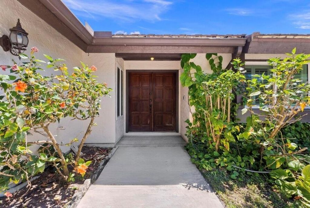 Photo of 1814 SE Greendon Avenue, Port Saint Lucie, FL 34952 (MLS # R10981150)