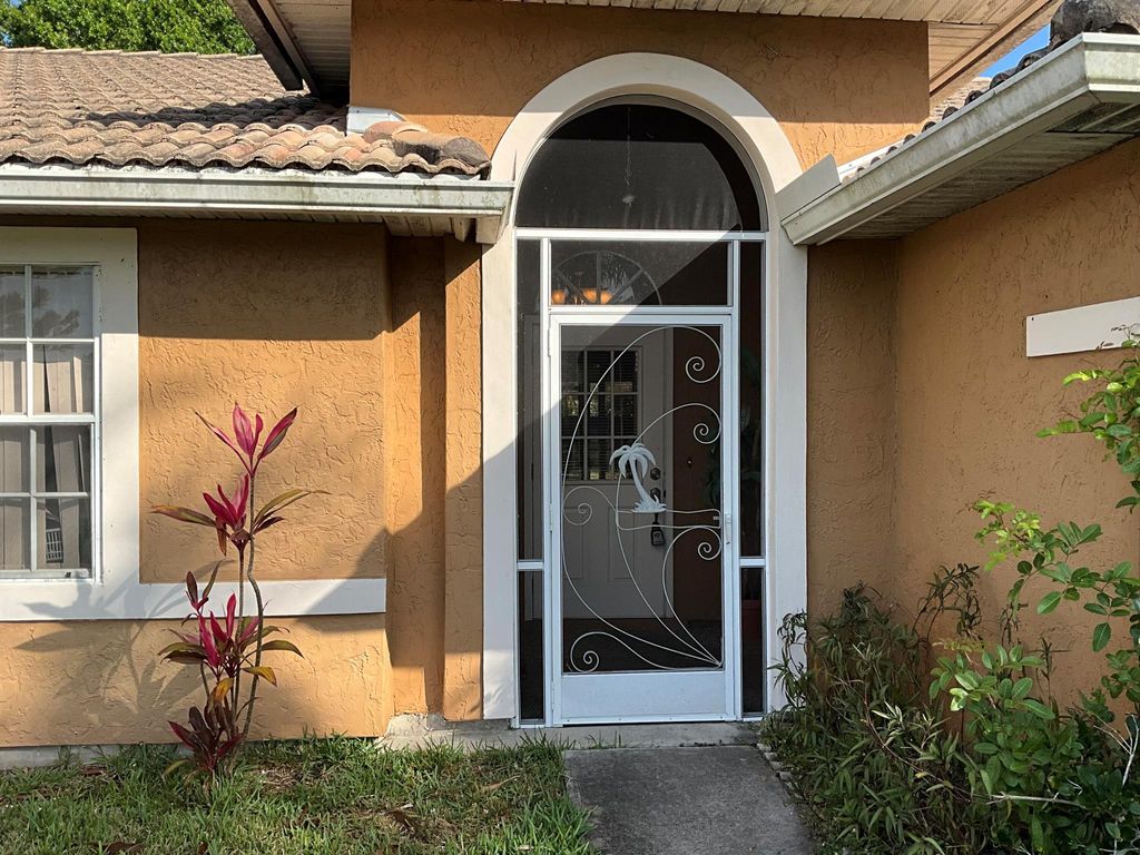 Photo of 937 SW Gwendolen Terrace, Port Saint Lucie, FL 34953 (MLS # R10970866)