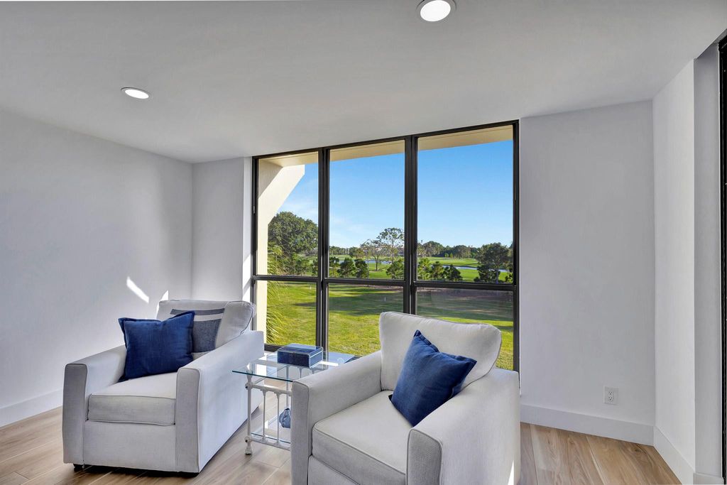 Photo of 5390 Woodland Lakes Drive #304, Palm Beach Gardens, FL 33418 (MLS # R10935506)