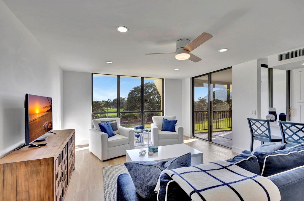 Photo of 5390 Woodland Lakes Drive #304, Palm Beach Gardens, FL 33418 (MLS # R10935506)