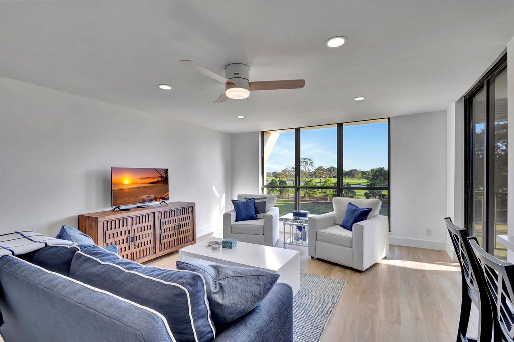 Photo of 5390 Woodland Lakes Drive #304, Palm Beach Gardens, FL 33418 (MLS # R10935506)