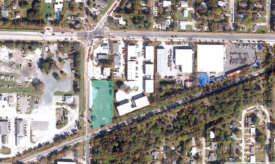 Prime Commercial/Industrial Opportunity in South Fort Pierce!This 1.16-acre site offers outstanding visibility with 371 feet of frontage on Oleander Ave and 150 feet of depth. The site has General  Commercial zoning with Industrial Land Use.  The property is high, dry, and mostly cleared, with municipal water, sewer, and gas available (see utility map in photos). Extensive due diligence materials are on hand, including survey, topo, Phase I environmental, and geotechnical reports, giving a head start on development. The owner has completed a detailed site plan and engineering for a two-story warehouse with offices, designed with a French drain system under the parking lot. Ideal for a 12,000-15,000 SF project, this property is ready for your next commercial or industrial build.