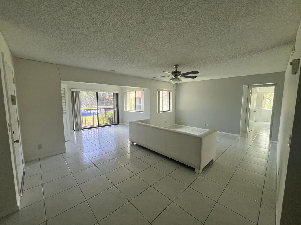 Photo of 504 Shady Pine Way #A2, Greenacres, FL 33415 (MLS # B26009767)