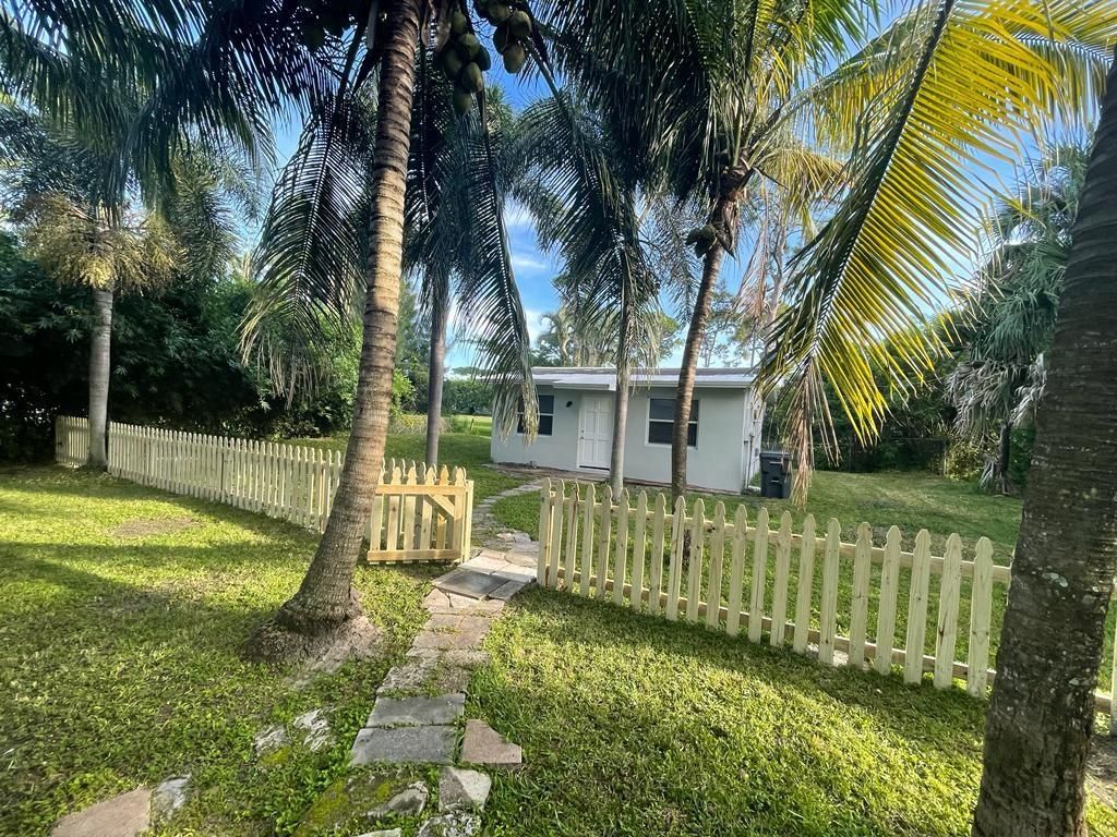 Photo of 2729 Helyn Rd Rd, Lake Worth Beach, FL 33461 (MLS # F10347952)