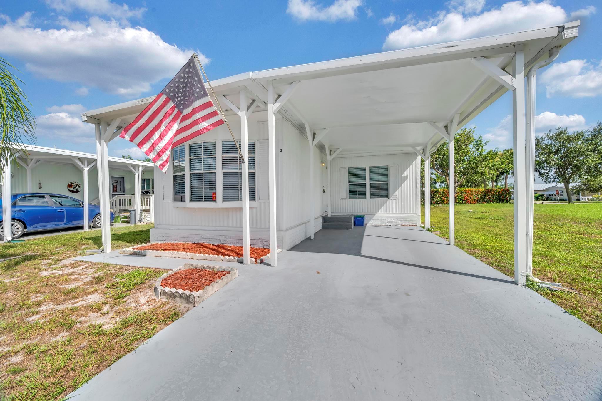 This stunning 2-bedroom, 2-bathroom mobile home has been completely remodeled with modern elegance and comfort in mind. Step inside to discover new LVT flooring throughout, complemented by stylish crown molding that adds a touch of sophistication. The brand-new kitchen boasts sleek white shaker cabinetry, with ample space featuring a large island. Both bathrooms have been full updated with modern vanities, new shower and a tub in the master. Perfectly situated in vibrant Port St. Lucie, this move-in-ready gem combines low-maintenance living making it great for anyone seeking a cozy haven. Don't miss this opportunity to own a beautifully renovated home in a prime location!