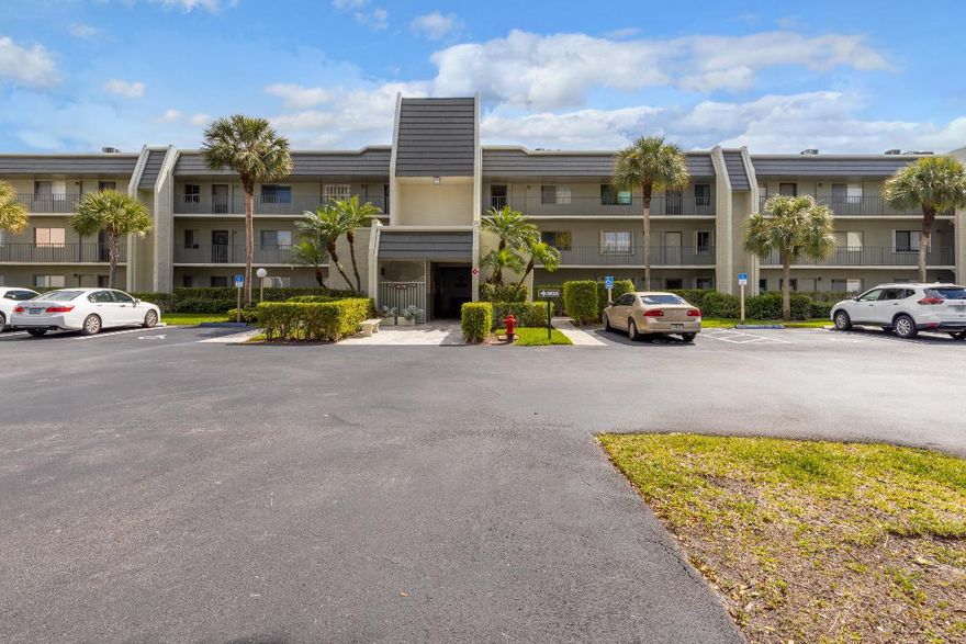 The minute you open the door of this 2/2 condo you know you have arrived home. Light bright and airy you will appreciate the wood plank ceramic tile flooring throughout the living area.  Enjoy the updated white shake kitchen cabinets, featuring white granite counter tops and newer appliances. Accordion shutters on the windows and impact glass on the back sliding doors, upgraded high hats, and A/C from 2017.  The building has been freshly painted.  Don't wait this unit won't last.