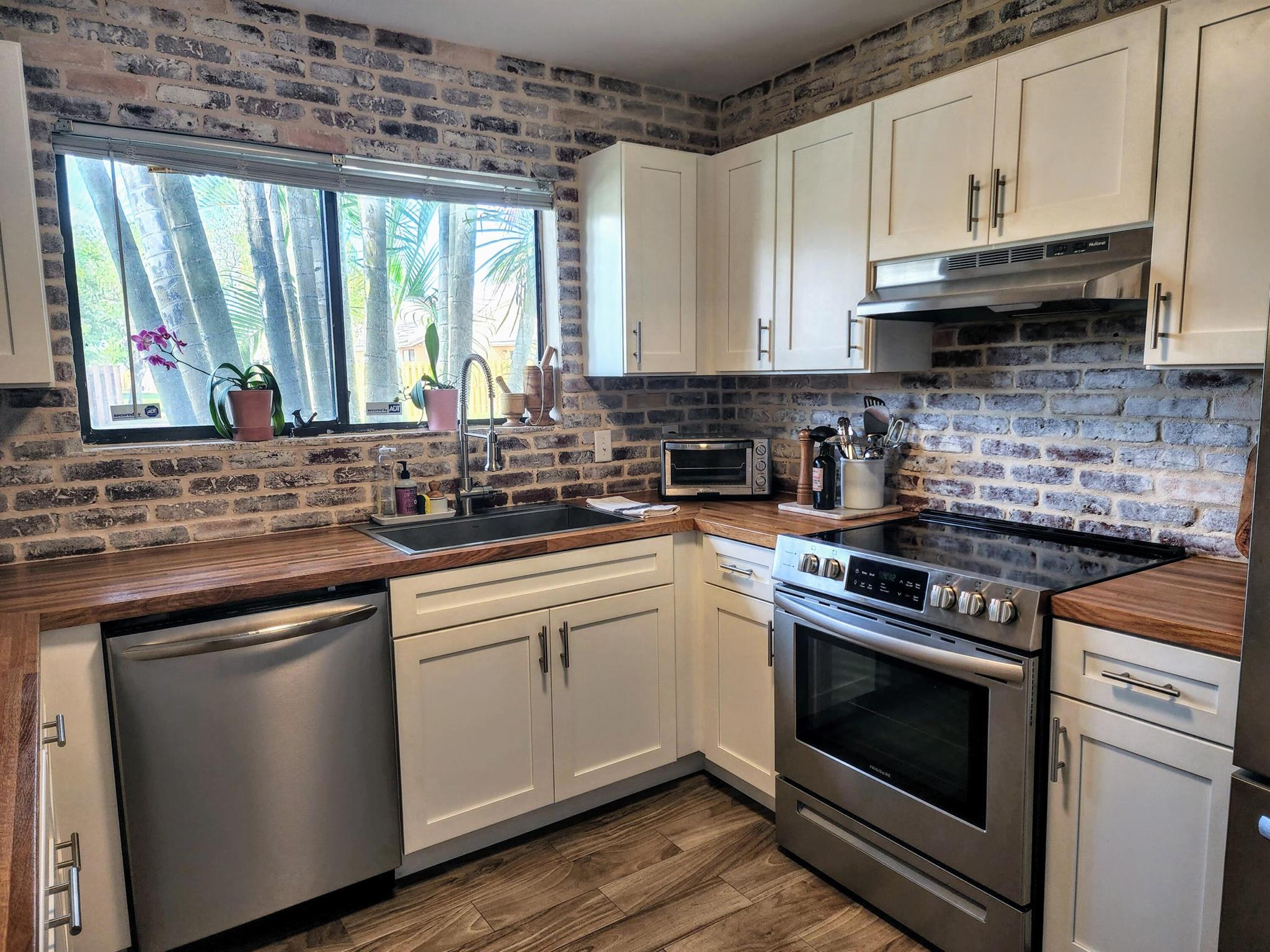 Stunningly updated 2-bedroom, 2-bathroom villa located in the highly sought-after community of Country Fair. This charming home features two convenient parking spaces right at your doorstep, a private fenced backyard, and a screened-in patio perfect for relaxing or entertaining. Investor-friendly with no rental restrictions, this property is ideal for both homeowners and investors. Enjoy a prime, central location close to major roadways, shopping, dining, and top-rated schools. The community offers fantastic recreational amenities, making it a wonderful place to call home!
