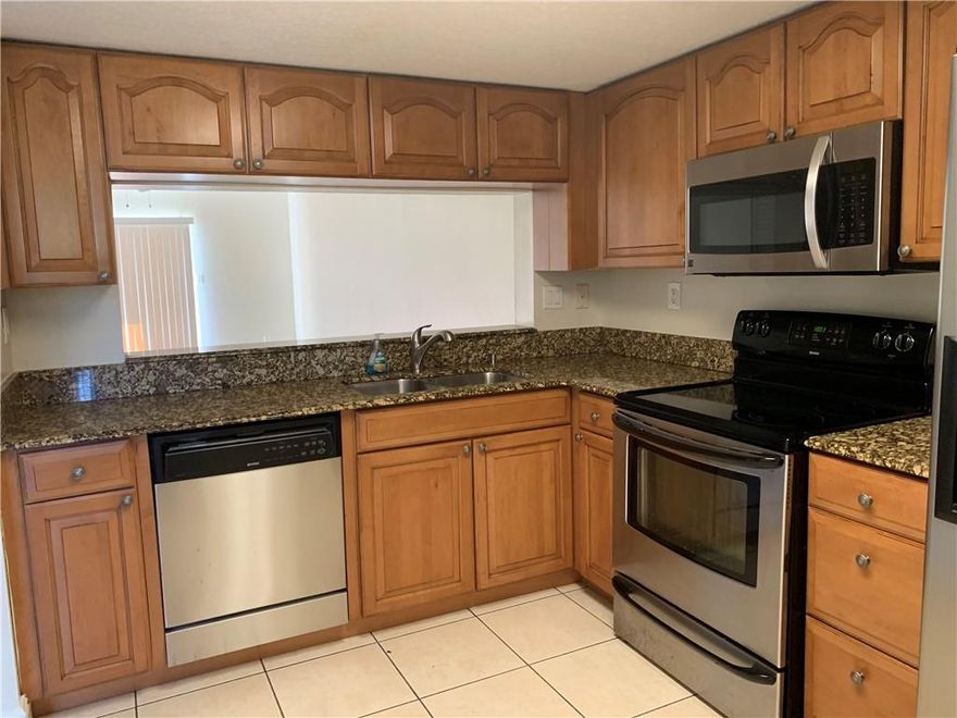 BEAUTIFUL 2/2 CORNER UNIT AFTER COMMUNITY FAIRWAY GREENS, WOOD KITCHEN CABINETS AND GRANITE  COUNTER, STAINLESS APPLIANCES, SPACIOUS MASTER WITH WALK IN CLOSET, STORAGE IN PORCH,PATIO WITH LAKE VIEW, FULL SIZE WASHER/DRYER IN UNIT, GREAT OPPORTUNITY FOR INVESTORS YOU CAN RENT IMMEDIATELY