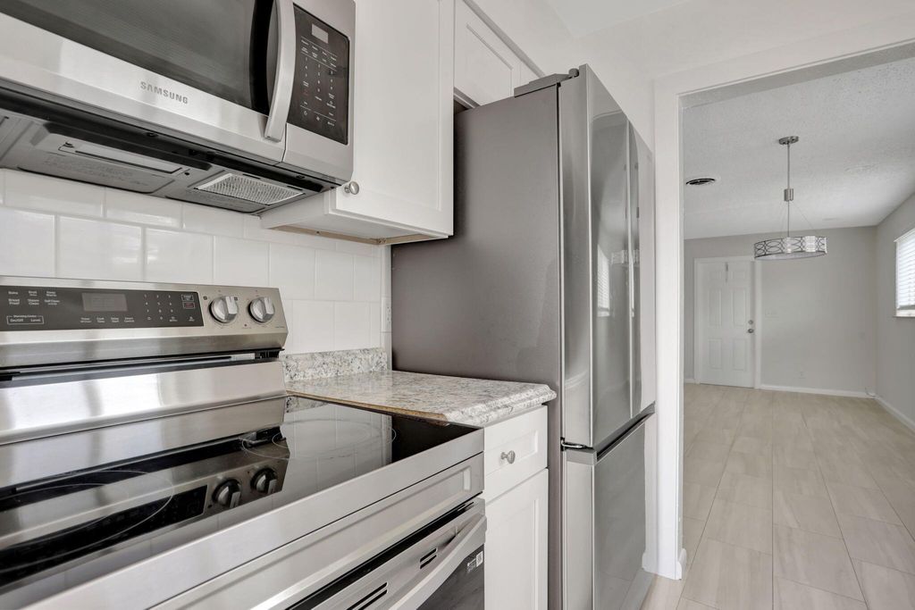 Photo of 3041 NE 7th Avenue #A, Pompano Beach, FL 33064 (MLS # R11123446)