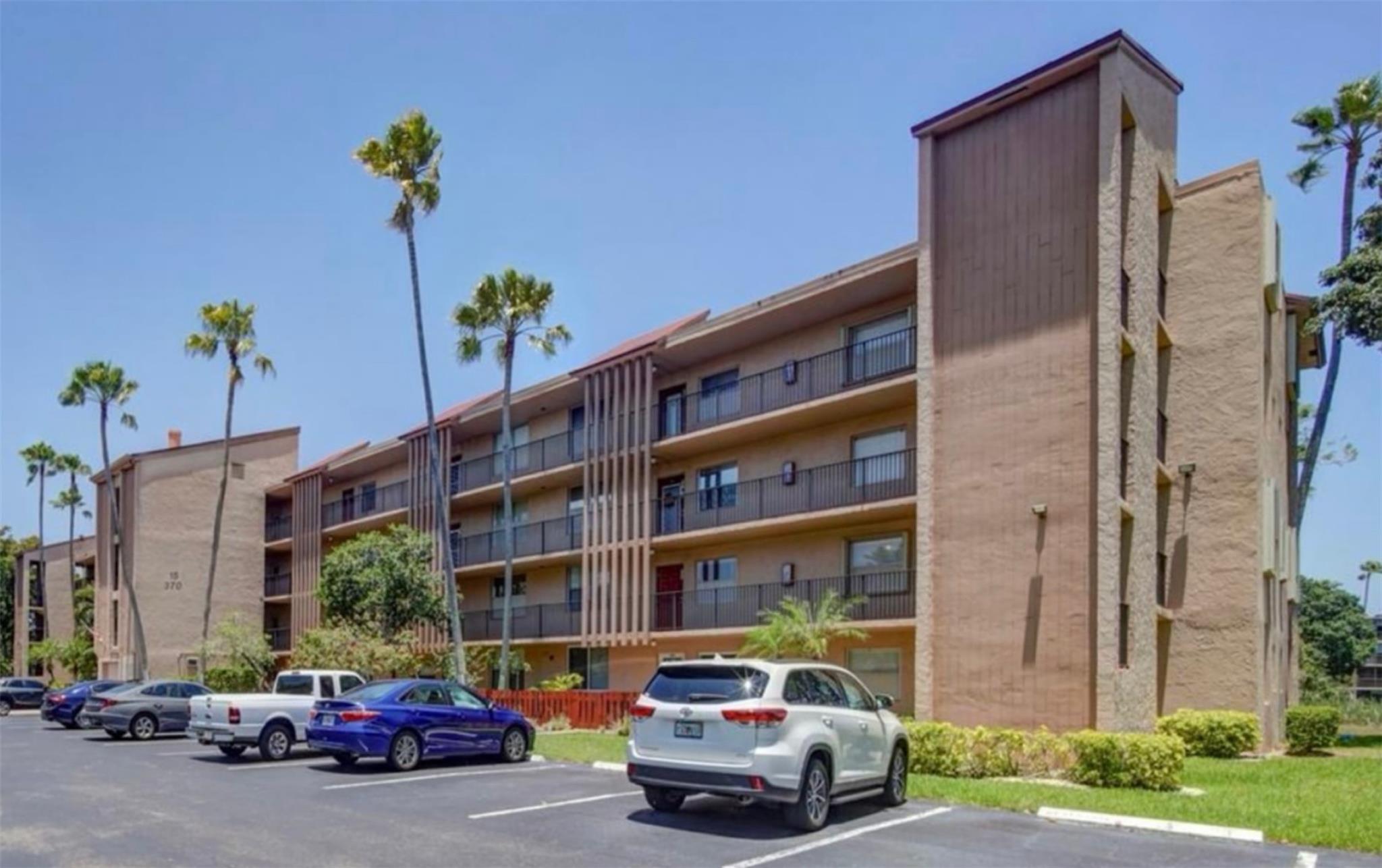 Charming, Turn Key 2BR/2BA Water View Condo in Palm Lakes 55+ Community. This move-in-ready condo offers an Updated Kitchen, granite countertops, newer cabinets, brand-new appliances, and an in-unit washer and dryer. Stylish flooring runs throughout the spacious layout. Relax on the oversized balcony with serene water views accessible from both the living room and the Large primary suite. The primary bedroom features a walk-in closet and a fully renovated en-suite with a walk-in shower. The second bedroom is steps from an updated guest bath. Plus, there’s generous exterior storage. Palm Lakes is an active 55+ community with two pools, a clubhouse, tennis courts, and more. Close to shopping, Pharmacy, dining, hospitals, and major highways. Just 10 miles from the beach