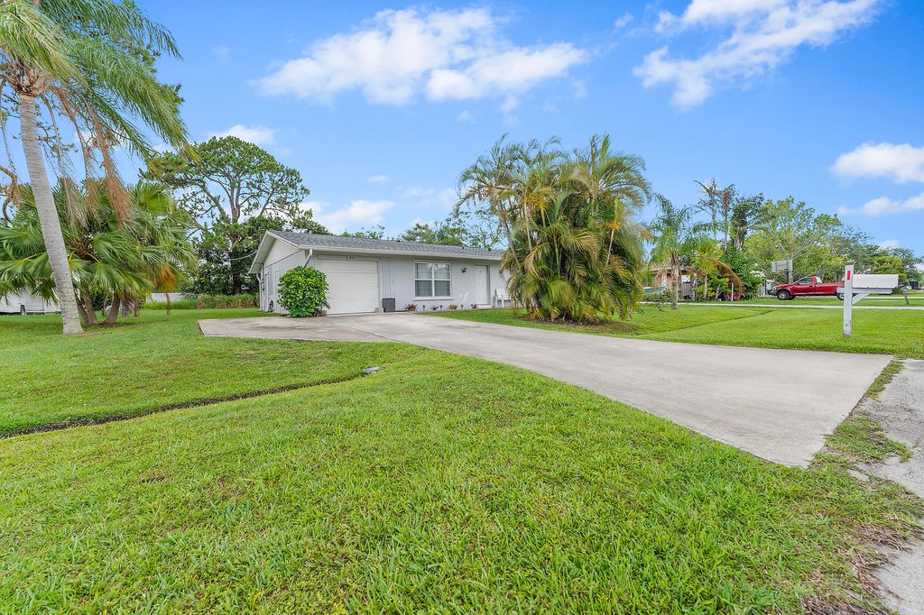 Photo of 590 SE Anchor Lane, Port Saint Lucie, FL 34983 (MLS # R11096380)