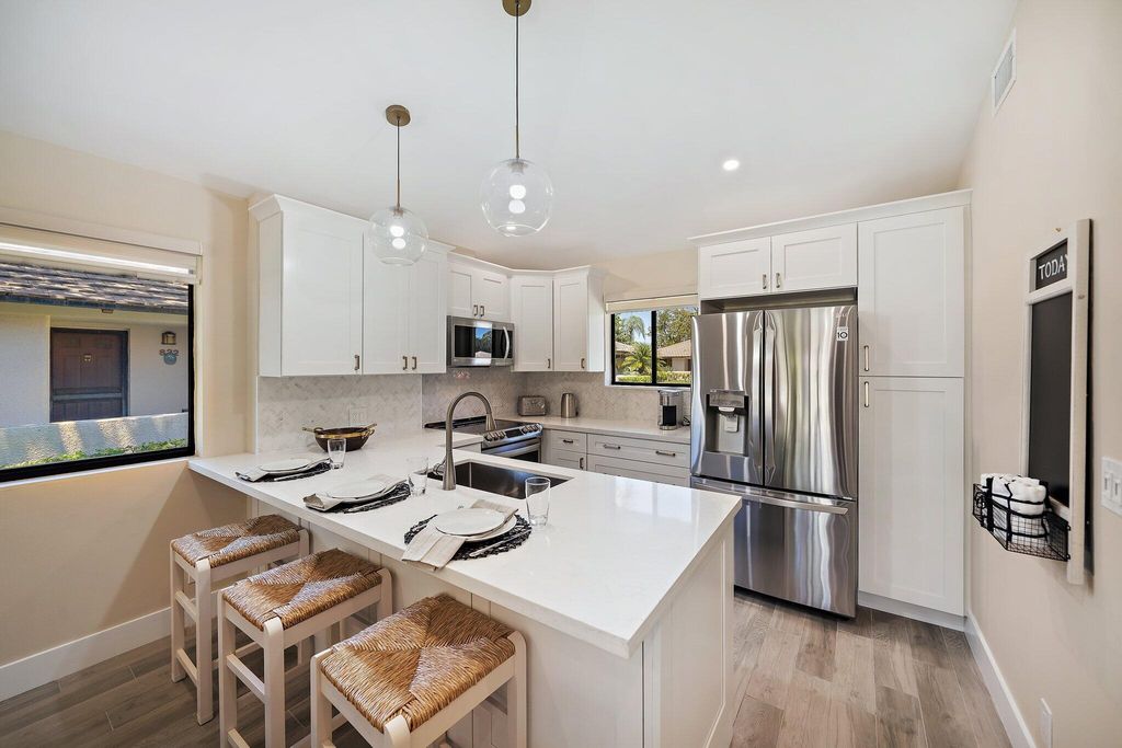 Photo of 821 Club Drive, Palm Beach Gardens, FL 33418 (MLS # R11159927)