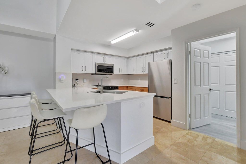 Photo of 3209 Clint Moore Road #205, Boca Raton, FL 33496 (MLS # R11047120)
