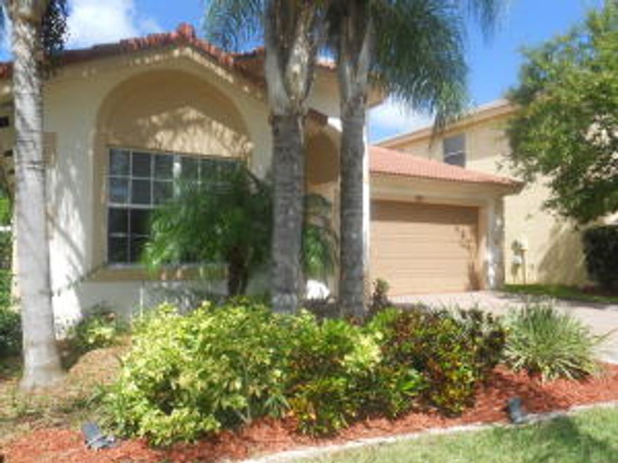 LOCATED ON A CUL-DE-SAC THIS SPACIOUS 2189 sf  3 BEDROOM 2 BATH HOME HAS SOARING CEILINGS. OPEN EAT IN KITCHEN WITH CORIAN COUNTERS,SIDE BY SIDE FRIDGE AND DOUBLE OVEN, THE BREAKFAST BAR OPENS UP TO LIVING ROOM. SPACIOUS MASTER BEDROOM WITH OVER SIZED CLOSETS. HIS & HERS SINKS WITH SEPARATE SHOWER AND ROMAN SOAKING TUB. SPLIT BEDROOMS WITH BEAUTIFUL FRENCH STYLE DOORS SEPARATING BEDROOMS FROM MAIN LIVING AREA FOR ADDED PRIVACY. CROWN MOLDING STANDS OUT IN THIS VERY INVITING HOME.SEPARATE DINING ROOM WITH EXTRA SPACE FOR A SITTING AREA OR AN OFFICE. NEW WASHER & DRYER IN THE LAUNDRY ROOM WITH DEEP SINK. WROUGHT IRON FENCED BACK YARD WITH BRICK PAVER PATIO. THERE IS A GENERATOR GRID & FRIDGE IN THE 2 CAR GARAGE.   UPDATED AUTO LIGHTING IN PARTS OF THE HOUSE. BEAUTIFUL FRUIT TREES.