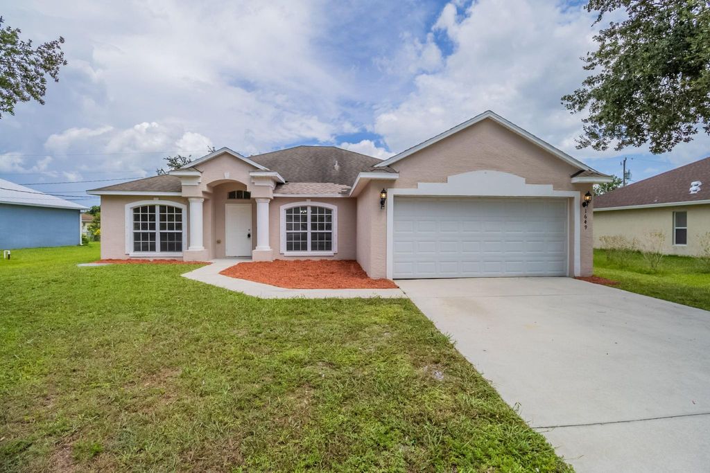 Photo of 1649 SW Morelia Lane, Port Saint Lucie, FL 34953 (MLS # F10527952)
