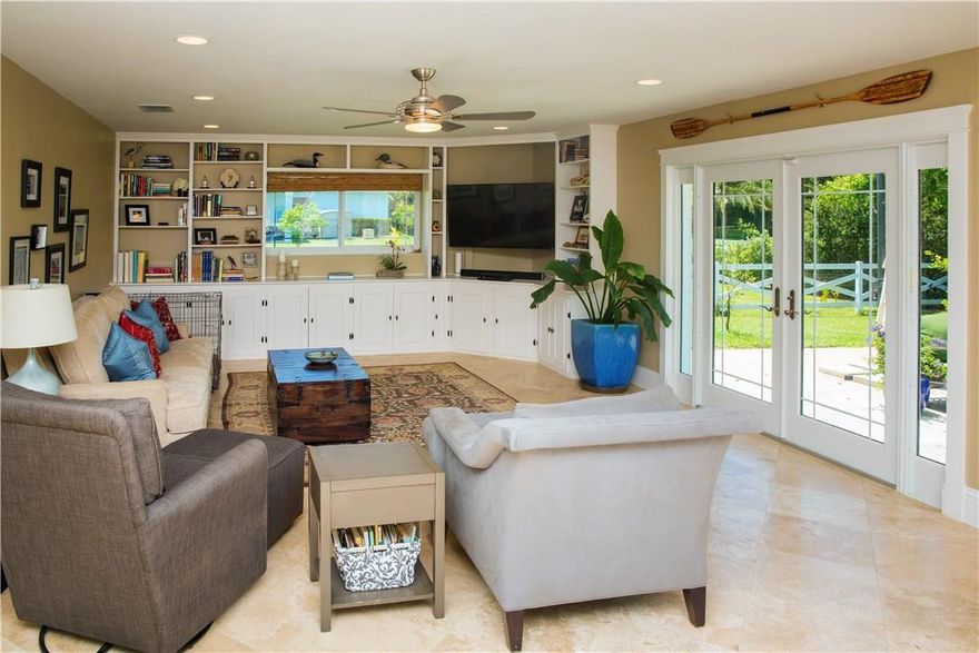 This beautifully remodeled property sits on one acre in desirable Southwest Ranches.  With a completely renovated interior, including kitchen, bath, interior/ exterior paint, flooring, and patio, this home is truly turnkey!  Front windows are impact, rear windows have Astroguard hurricane protection.  This oversized lot is securely fenced, offering one electric gate, and a second manual entry gate.  There is an additional 1750 sg. ft. garage as well, with bay doors, hurricane shutters, and new roof!